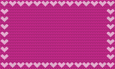 Purple fabric knitted background framed with knit hearts.