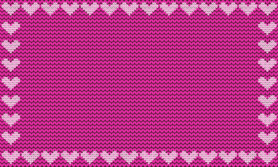 Purple fabric knitted background framed with knit hearts.