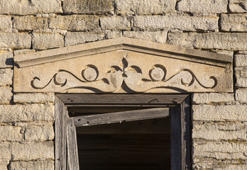 carved lintel over window on abandoned stone house of Dr. William B. Jones near Florence, Kansas - obrazy, fototapety, plakaty