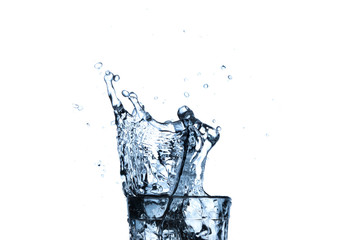 water splash in glass isolated on white background