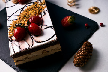 Strawberry Christmas cake with whipped cream