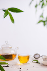 Cups of tea on wooden table background