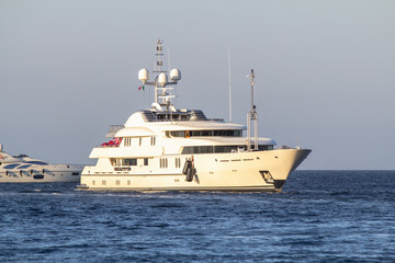 White Yacht in a sea near the coast