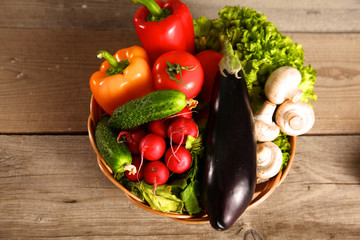 Fresh vegetables on a clean wooden table