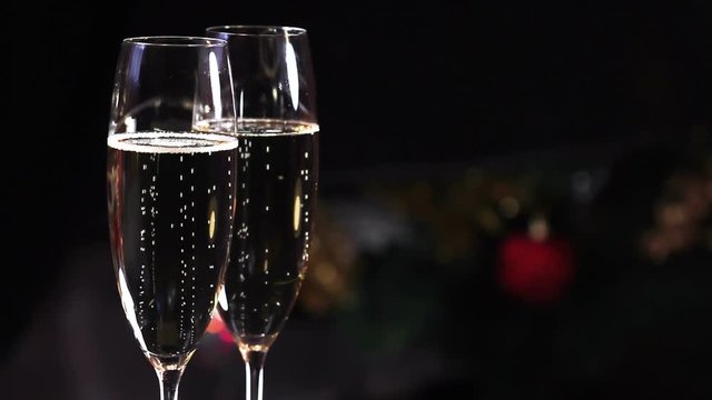 Glasses of champagne on New Year's backgrounds