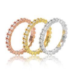 3D illustration isolated three different yellow, rose and white gold or silver eternity band diamond rings with reflection on a white background
