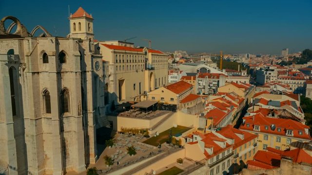 Panoramic exterior shot of Convento do Carmo, Convent of Our Lady of Mount Carmel and Praca do Rossio square in Lisbon, Portugal
