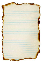 Old lined paper with burned edges