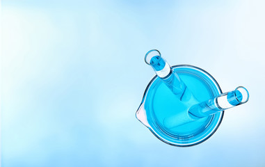 Beaker with two test tubes top view