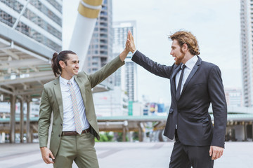 Business man show touching hands with partner. Concept of deal successful and negotiation agreement.