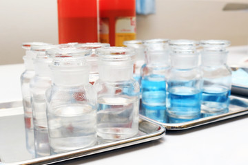 Reagent bottle with alcohol for medical training of operating room.