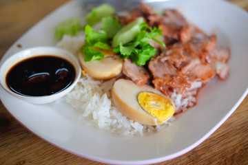 Barbecued red pork in sauce with rice