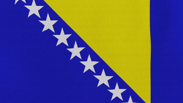 Loopable: Flag of Bosnia and Herzegovina...Bosnia and Herzegovina official flag gently waving in the wind. Highly detailed fabric texture for 4K resolution. 15 seconds loop.