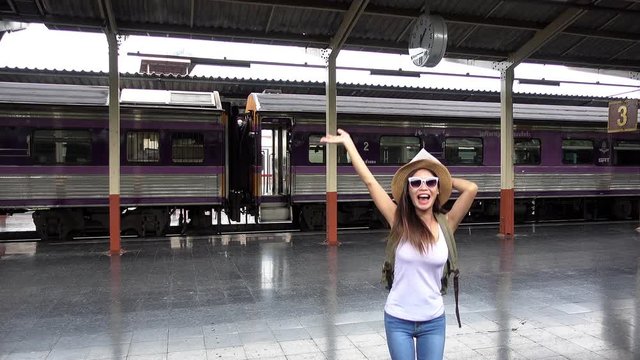 Travel by train, Girl traveling the tourist train station.