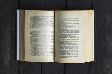 Obraz premium Old Book on Wooden Desk