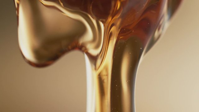 Thick honey dripping.  Shot with high speed camera, phantom flex 4K. Slow Motion.
