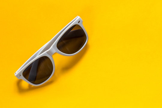 Sunglasses White Frame On A Yellow Background