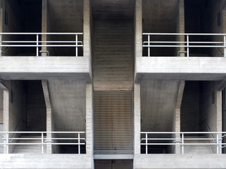 concrete staircases and walkways in an old brutalist type building