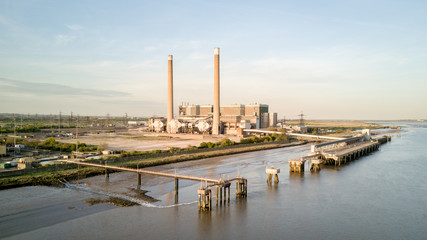 Tilbury Power Stations, Essex, UK. The decommissioned Tilbury A and B fossil fuel power stations on the banks of the River Thames estuary, England.