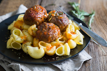 Pasta with meatballs in tomato sauce