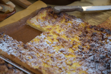 Thin Cake with Cream and Pine Nuts