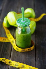 Healthy detox green smoothie for fitness and weight loss diet and nutrition.