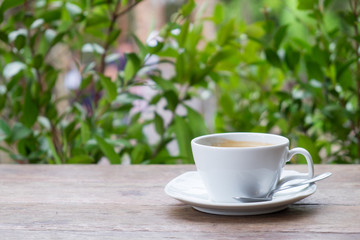 Black coffee on the wood table.