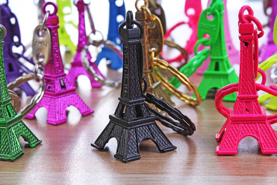 Eiffel tower statue. Paris tourism illustration. Beautiful metallic plastic souvenir statue. Colorful illustration of french tourism or any other concept. Eiffel tower colorful and black grief