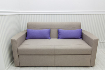 sofa furniture in room corner.