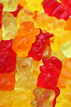 Gummy bear background. Gummy bears as texture. Gum bear candy colorful pattern. Texture background.