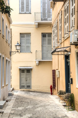 A typical street with historical buildings in the ancient town Nafplio in Greece
