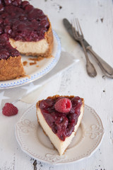 Homemade cheesecake with cherries on a plate