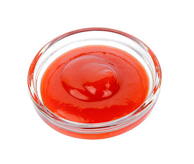 Tasty ketchup in bowl isolated on white