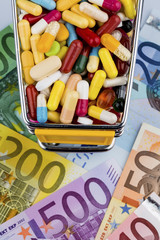 tablets, shopping trolleys, euro bills