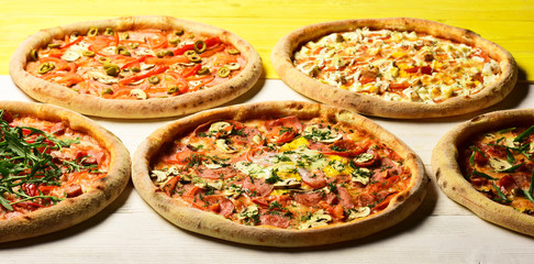 Italian pizza and pizzeria. Take away food with various ingredients