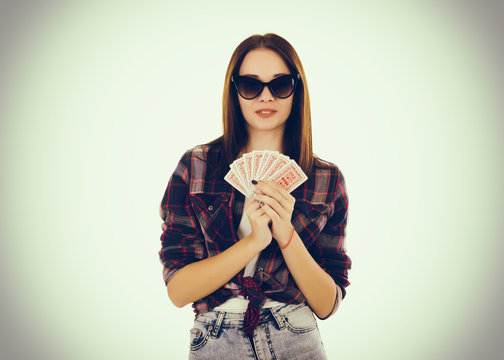 Young cute woman with playing cards  