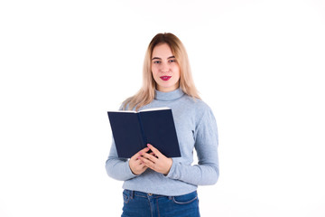 Young cute girl reads a book, isolated  