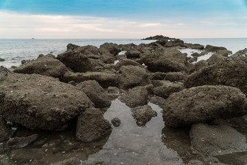 sunrise scenic with stone in foreground