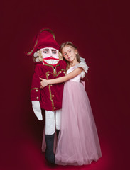 Fototapeta premium The beauty ballerina who holding a nutcracker