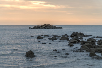 sunrise scenic with stone in foreground