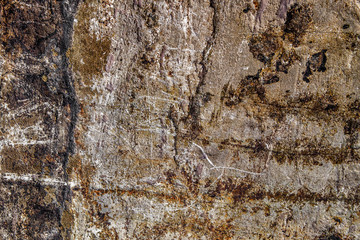 Old brown stone texture background. Scratched stone