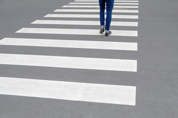 One walking on the zebra crosswalk