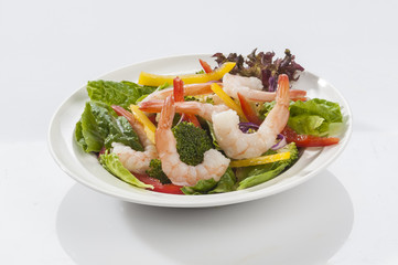 Jumbo Shrimp Salad with broccoli & Vegetable with coloured bell pepper on white plate with white background 