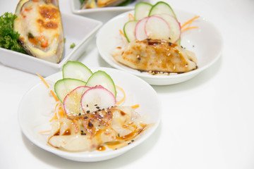 Gyoza on white cup