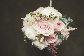 Beautiful wedding bouquet with different flowers, roses