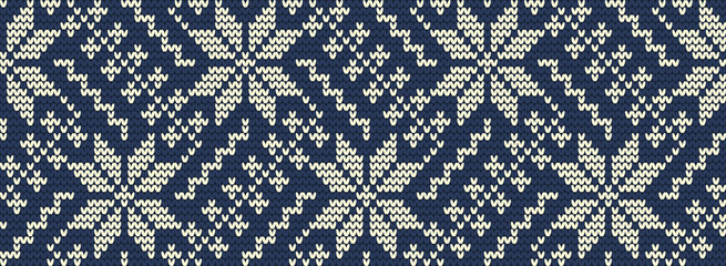 Knitted pattern on a blue background. Ornament. Border. Seamless sample. It can be used as a background. Vector illustration.