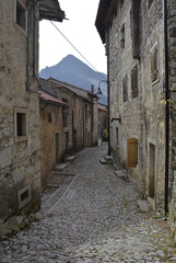 A small street in the hill village of Erto in Friuli Venezia Giulia, north east Italy. 