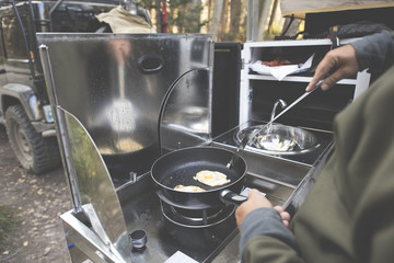 Cooking eggs while camping