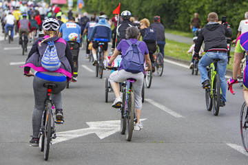 Fototapeta na wymiar Bicyclists in traffic public transport in the city