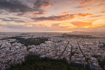 View of Acropolis and city of Athens from Lycabettus hill at sunset, Greece. 
